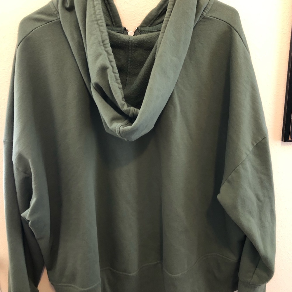 Olive green jacket.